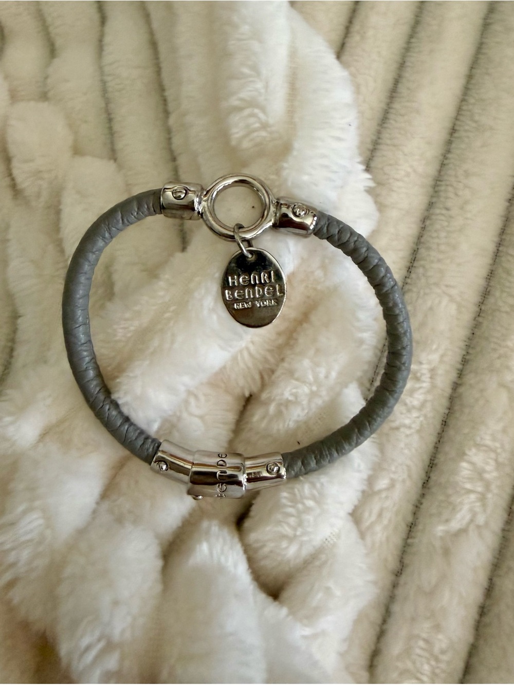 Henri Bendel Silver Logo Charm Bracelet with Gray Braided Band